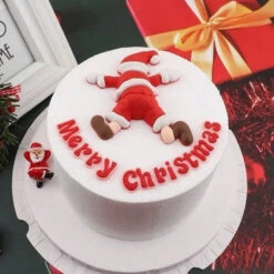 Liegender Weihnachtsmann Aus Kunststoff Mit Schriftzug